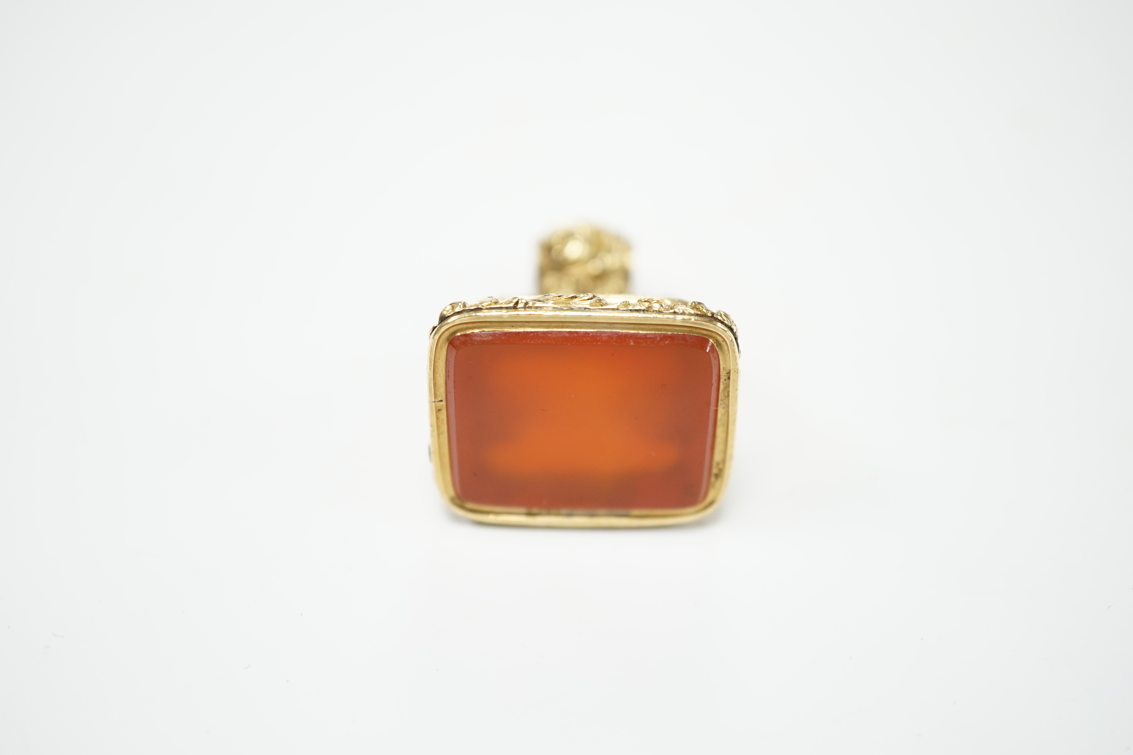 A Victorian yellow metal overlaid and carnelian set fob seal, 34mm.